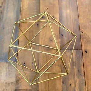 polygon metal painted gold.  8 x 8 inches